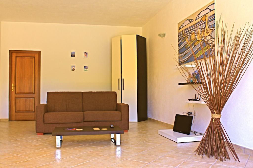 Residenze L'Isola Surf House Aparthotel Porto Pollo Room photo